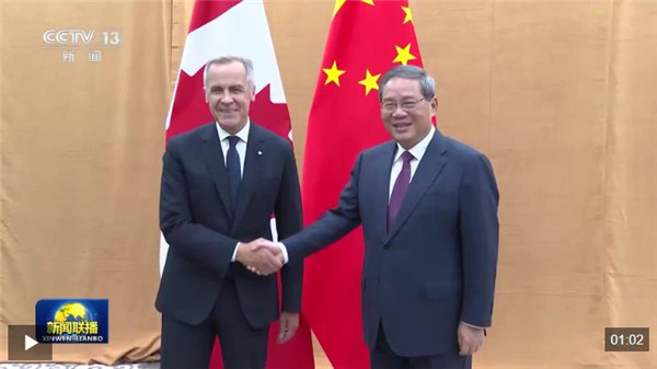 李强会见加拿大总理