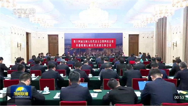 丁薛祥分别参加香港代表团、澳门代表团审议